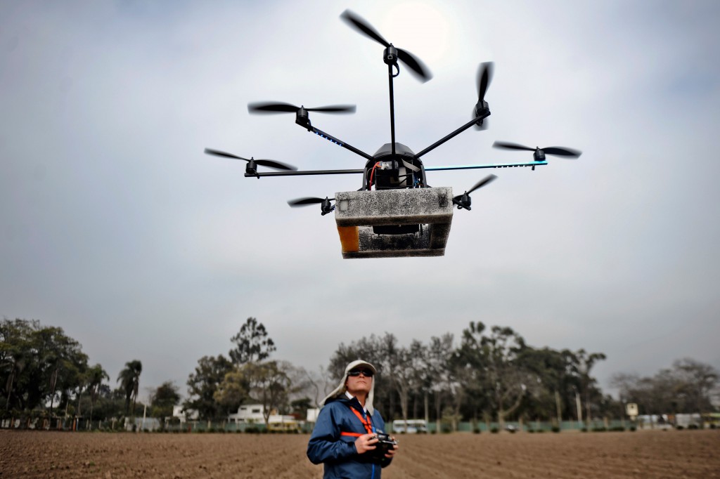 A man controls a drone