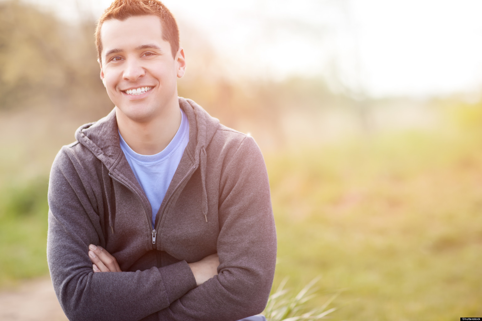 Young man standing in the field